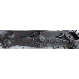 A Victorian Coalbrookdale design black painted cast iron fire fender