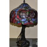 A Tiffany style coloured glass lamp,