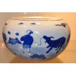 A Chinese blue and white brush pot, decorated with scenes of peasants and water buffalo 8.