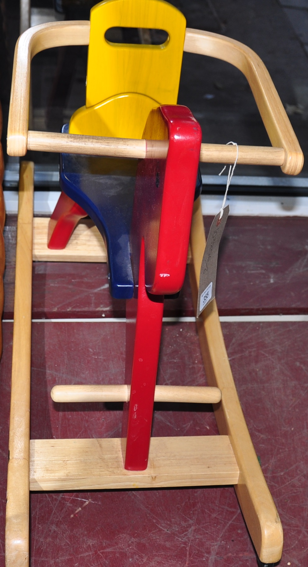 A toddlers' colourful rocking horse, by Pintoy.