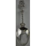 An 18th Century Dutch silver Christening spoon with rat tail bowl and cast handle with family