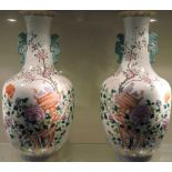 A pair of Chinese famille rose porcelain baluster vases,