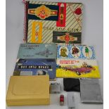 An assortment of tobacciana, including lighters, a Dunhill cigarette box, matchboxes,