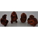 4 hardwood netsukes carved as assorted monkeys