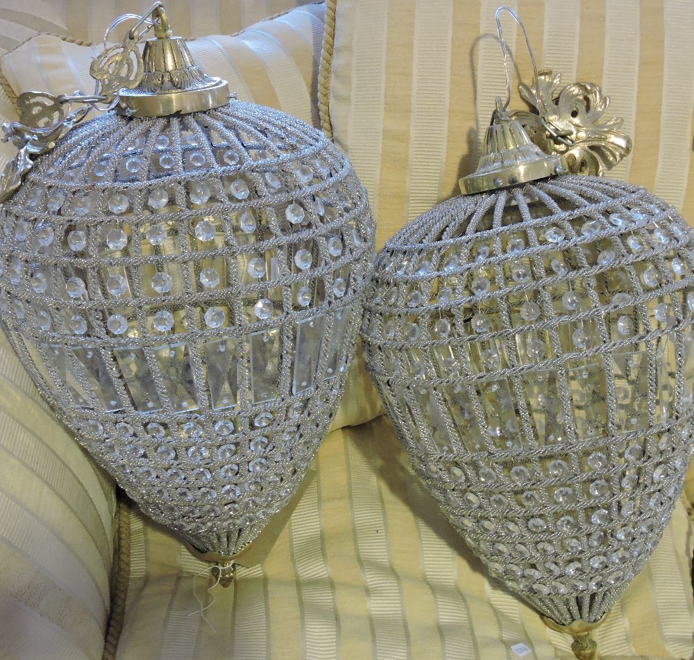 A pair of Louis XVI design gilt metal and crystal tear drop ceiling lights,