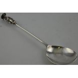 An 18th Century seal top apostle spoon with fig shaped bowl,