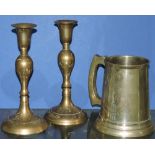 A pair of brass candlesticks together with a Silver Jubilee tankard