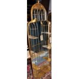 A large wall mirror, the gilt coloured frame in the form of a bird cage with birds,