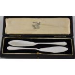 Pair of Art Deco silver butter knives hallmarked Sheffield 1942 by Thomas Bradbury in original