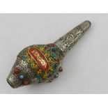A South East Asian white metal mounted shell, jewelled with turquoise, red, blue and yellow stones,