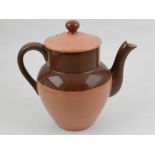 A Macintyre Burslem ware teapot, having a crackle glaze, on a salmon pink and maroon ground. H.
