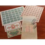 A collection of Chinese stamps and banknotes