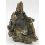 A Chinese bronze study of a seated Buddhist figure. H.18.