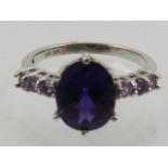 A 14 carat white gold and amethyst cocktail ring,