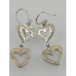 A pair of silver and opalite double heart drop earrings.