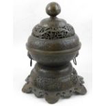 A cast bronze twin handled incense burner,