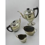 An early 20th century four piece silver coffee and tea set, having gadrooned design,