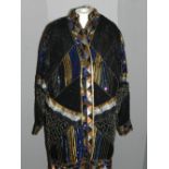 A Frank Usher silk and beaded jacket, approximate size M.