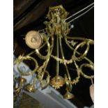 A Regency style seven branch electrolier, with square reeded scrolled branches with foliate caps and