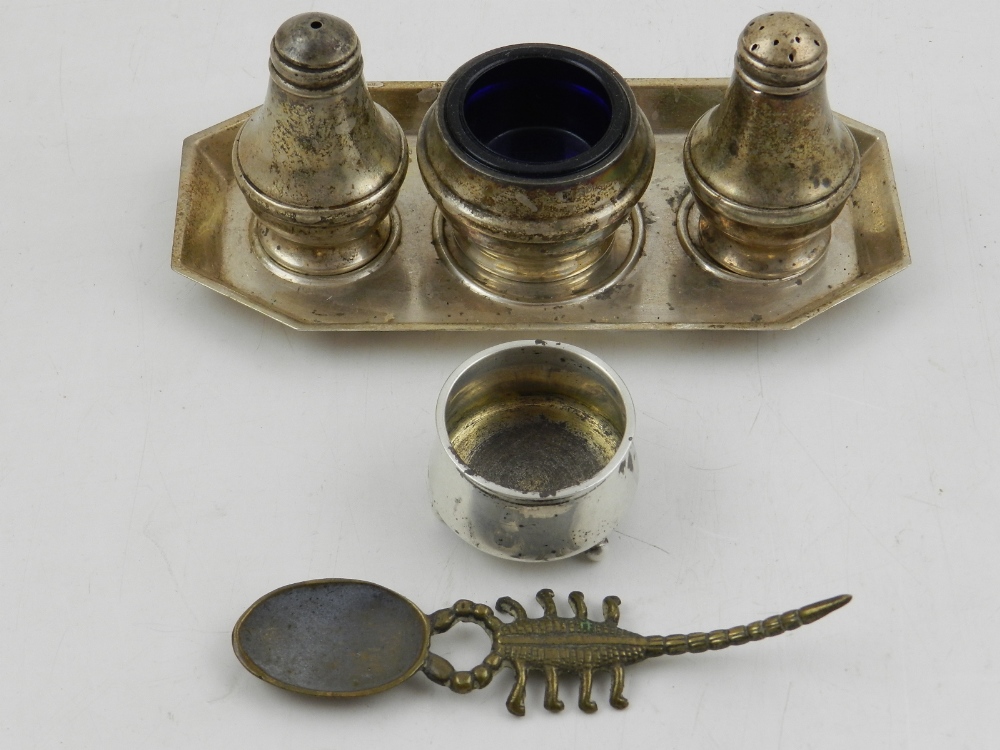 A silver cruet set, Birmingham, the three items on a rectangular tray with canted corners,