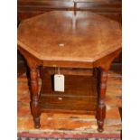 A late 19th century mahogany octagonal two-tier occasional table, having marquetry inlaid top,