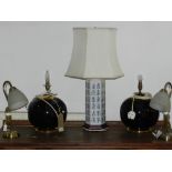 A pair of Contemporary lamps, of bulbous form, together with two brass lamps,