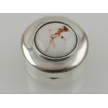 A novelty sterling silver circular pill box,