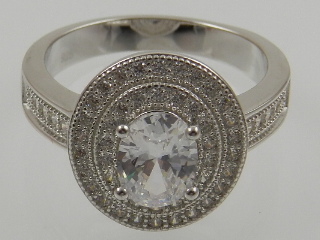 A silver and cubic zirconia set cluster ring.