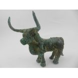 A Chinese bronze ox. L.13cm