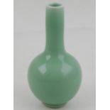 A Chinese porcelain celadon vase, bears blue leaf mark to base, H.