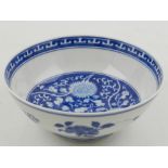 A Chinese blue and white porcelain bowl, decorated with flowers, bears six character mark to base.