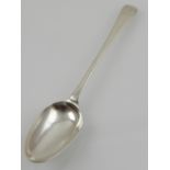 An 18th century silver serving spoon,