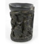 A Chinese brush pot, cast with figures below a tree, H. 16cm.
