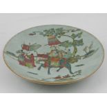 A Chinese porcelain dish, polychrome decorated with figure riding dragon, bears seal mark to base.