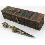A Tibetan bronze phurba, together with carved wooden box.