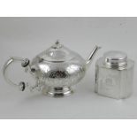 A plated teapot, having floral engraved decoration, together with a plated tea caddy,