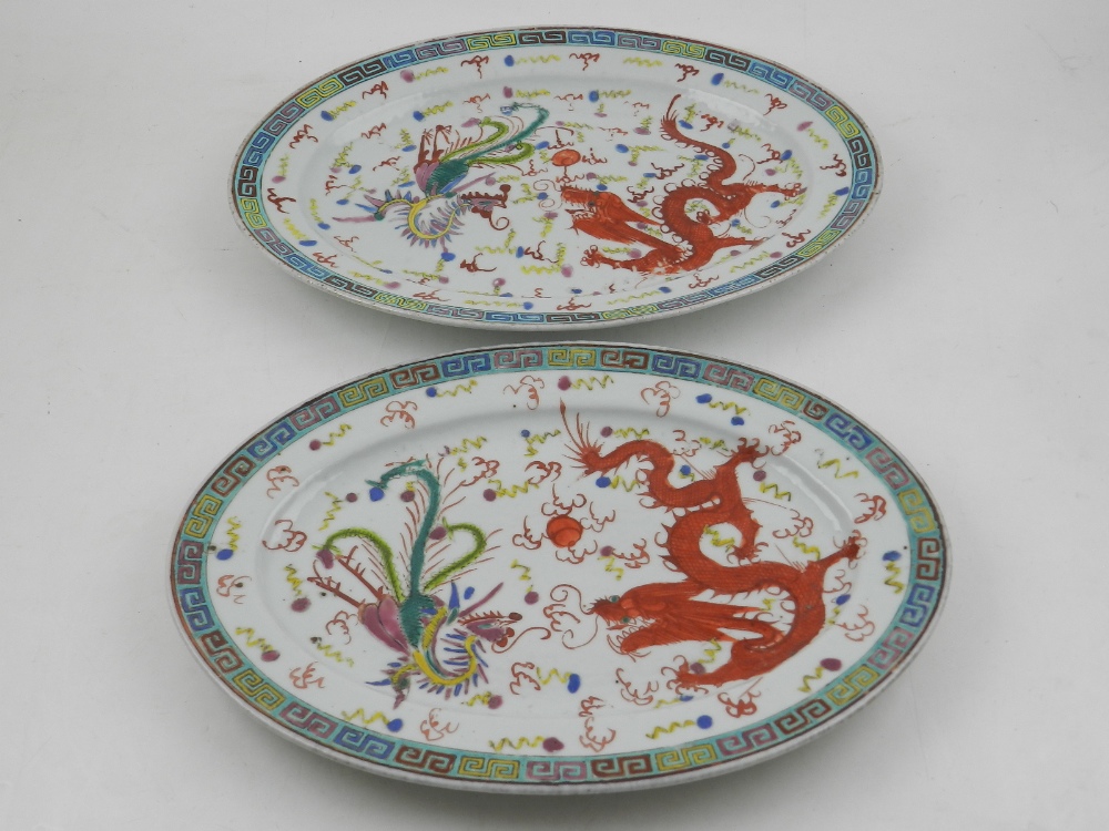 A set of two late 19th / early 20th century Chinese famille rose oval dishes,