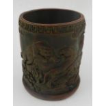 A Chinese wooden brush pot, decorated with tigers in landscape. H.