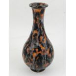 A Chinese porcelain vase, having orange, black and white drip glaze,  H.
