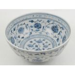 A Chinese blue and white porcelain bowl, decorated with stylised flowers and Greek key borders. D.