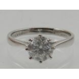 An 18 carat white gold and solitaire diamond ring, the stone of approx. 1.0 carats.