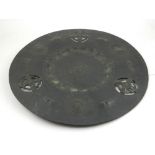 A late 19th century continental steel alms dish, decorated with pierced foliate rondels, D.