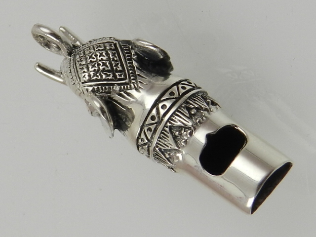 A novelty sterling silver whistle in the form of an elephant's head.