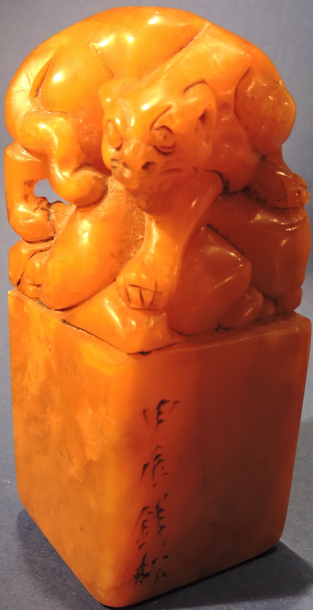 A Chinese soapstone seal carved with a tiger,