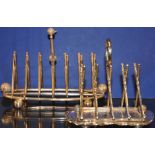 Two silver plated golfing toast racks