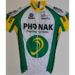 A framed Phonak BMC Skoda swisss cycling jersey,