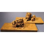 A Chinese pair of metal lion paperweights with three character marks to bases