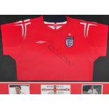 An England football shirt signed by Frank Lampard,