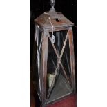 A vintage style distressed wood lantern of tapered square form, H.