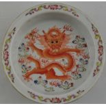 A Chinese famille rose dragon water pot, decorated with a dancing dragon,